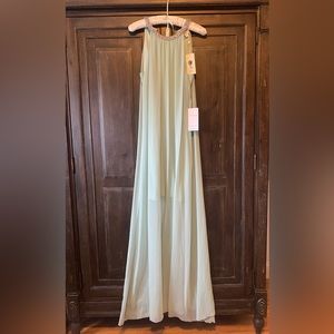 Gorgeous mint green floor length gown.  NEW WITH TAGS!